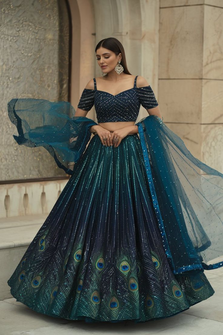 Peacock Radiance Couture Lehenga with shimmer and feather print for receptions