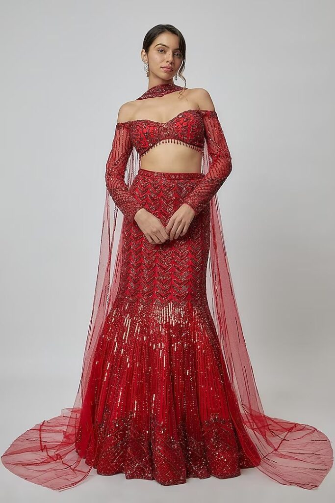 Red embroidered fish-cut lehenga with net full sleeves and shimmer work – Ethnora