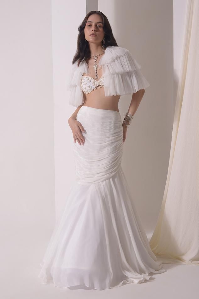 White ruched mermaid lehenga with floral bustier and layered sheer cape blouse – Ethnora