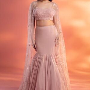 Peach pastel fish-cut lehenga with embellished blouse and cape dupatta – Ethnora