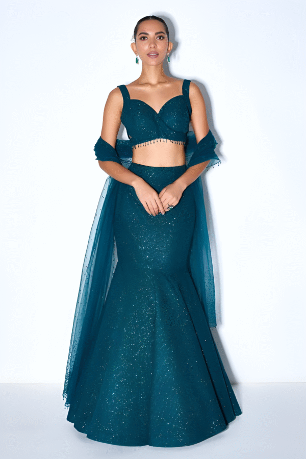 Teal mermaid-style lehenga with shimmer fabric and structured blouse – Ethnora